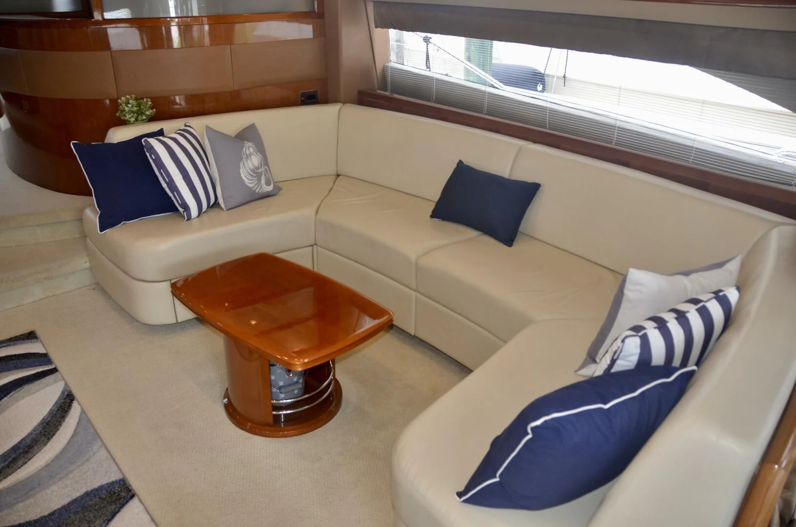 a living room with a couch and a coffee table aboard W Yacht for Sale