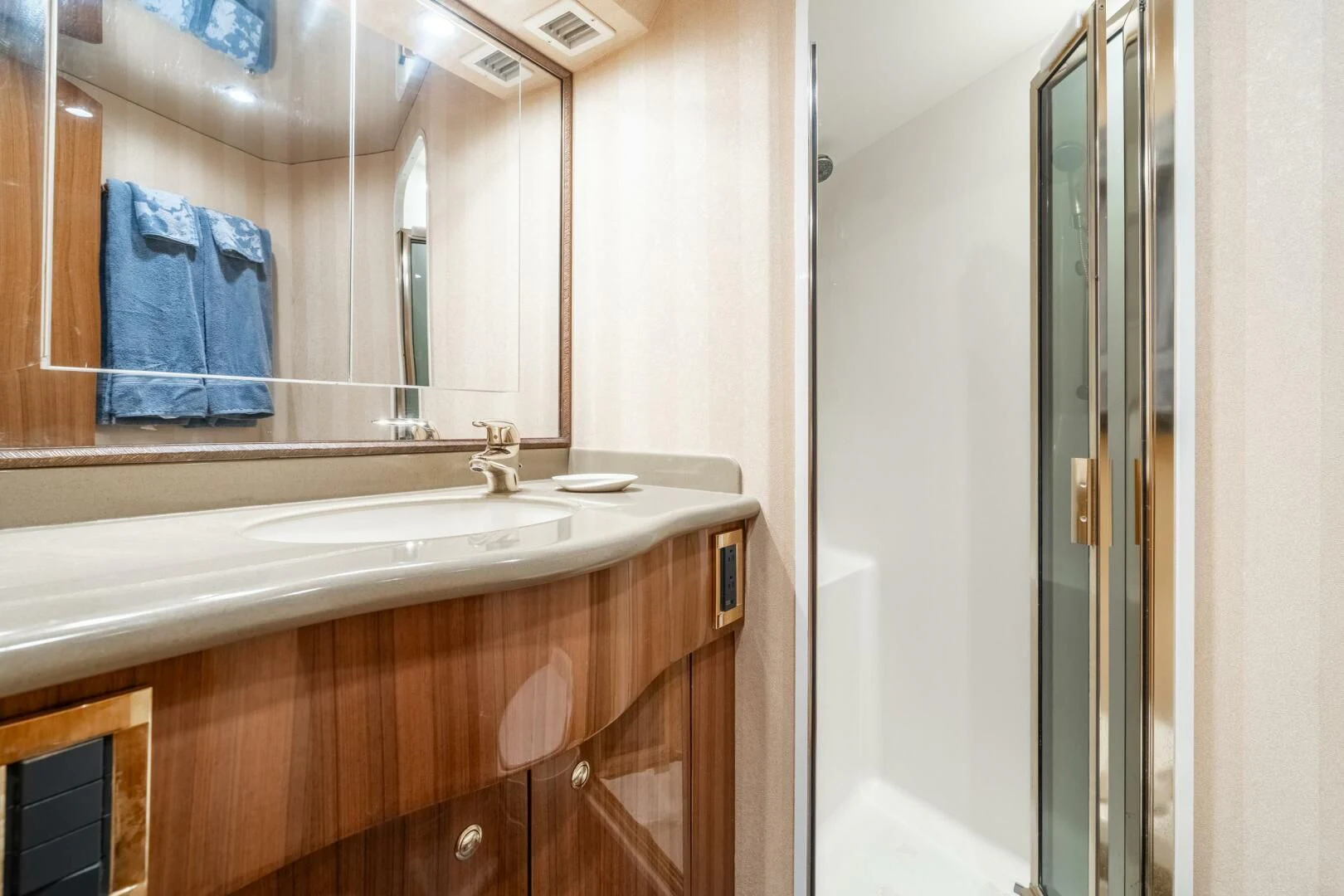 a bathroom with a large mirror aboard W Yacht for Sale