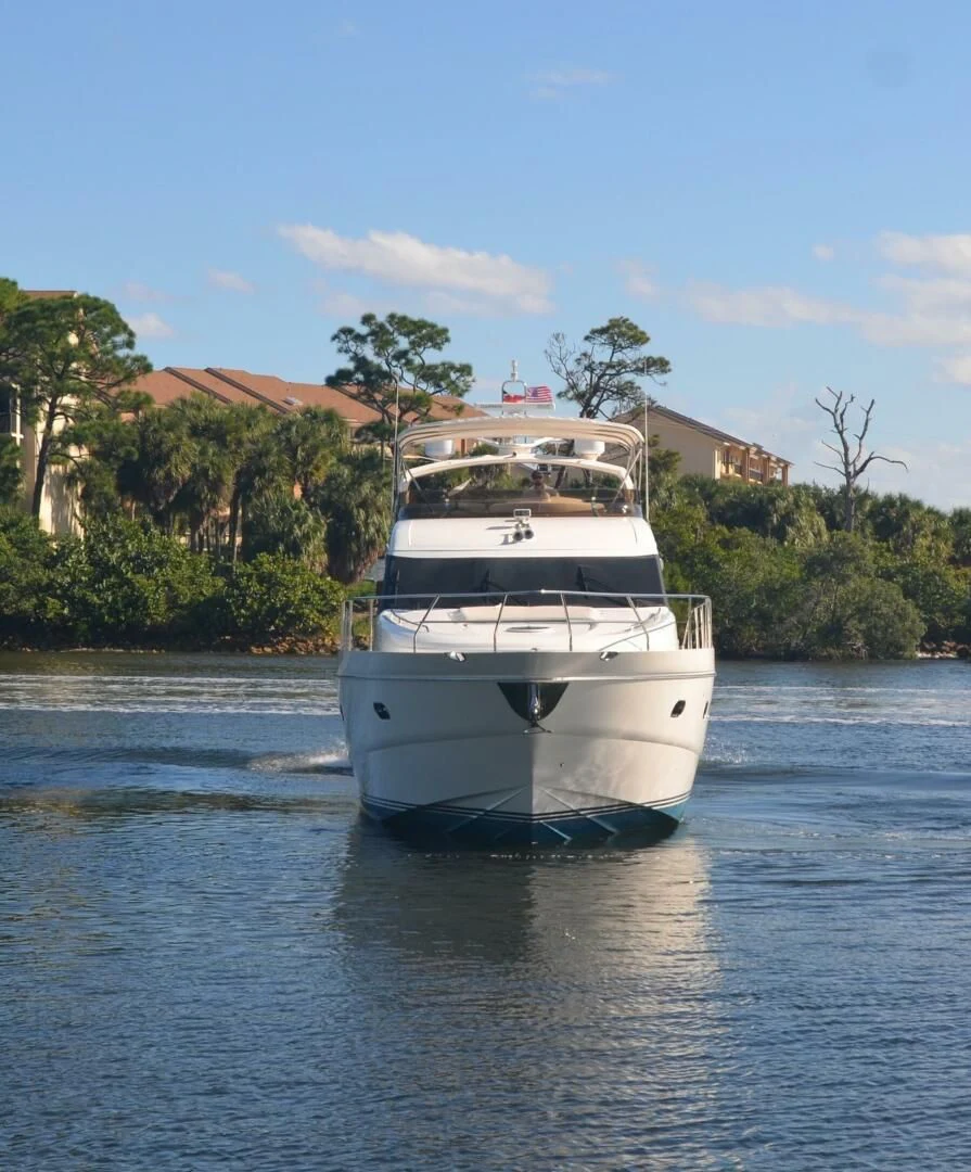 a white boat on the water aboard W Yacht for Sale