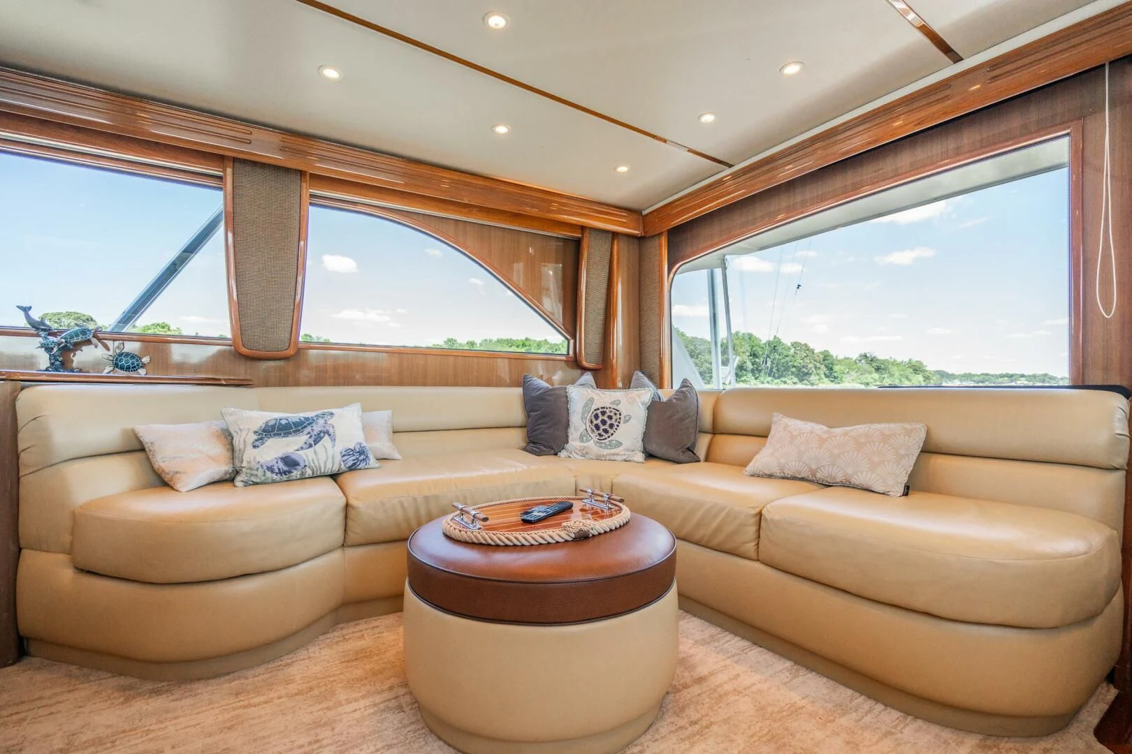 a living room with a couch and a table aboard W Yacht for Sale