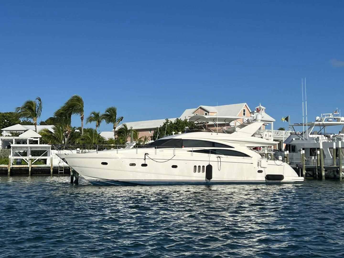 a white boat in the water aboard W Yacht for Sale