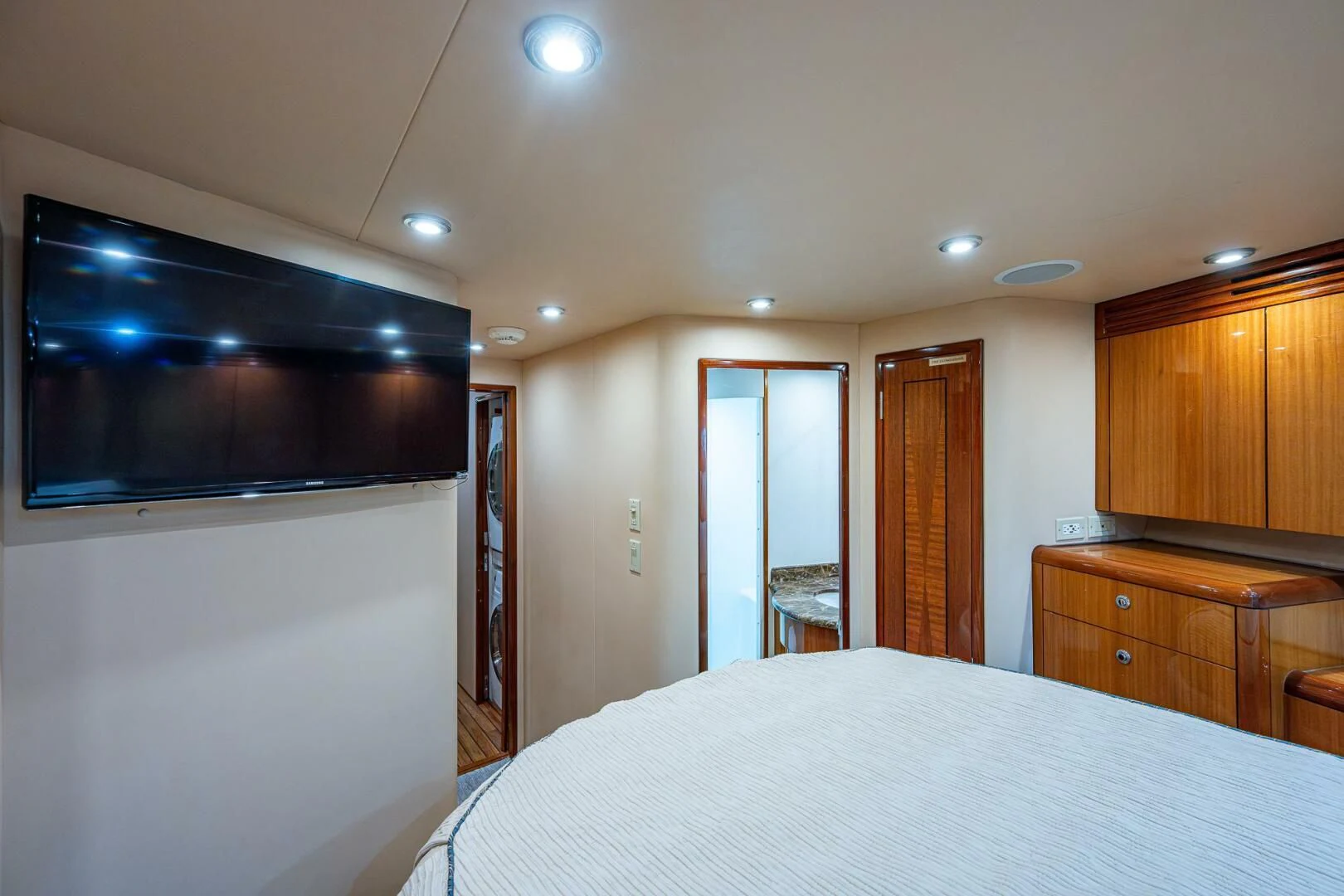a bedroom with a large bed aboard W Yacht for Sale