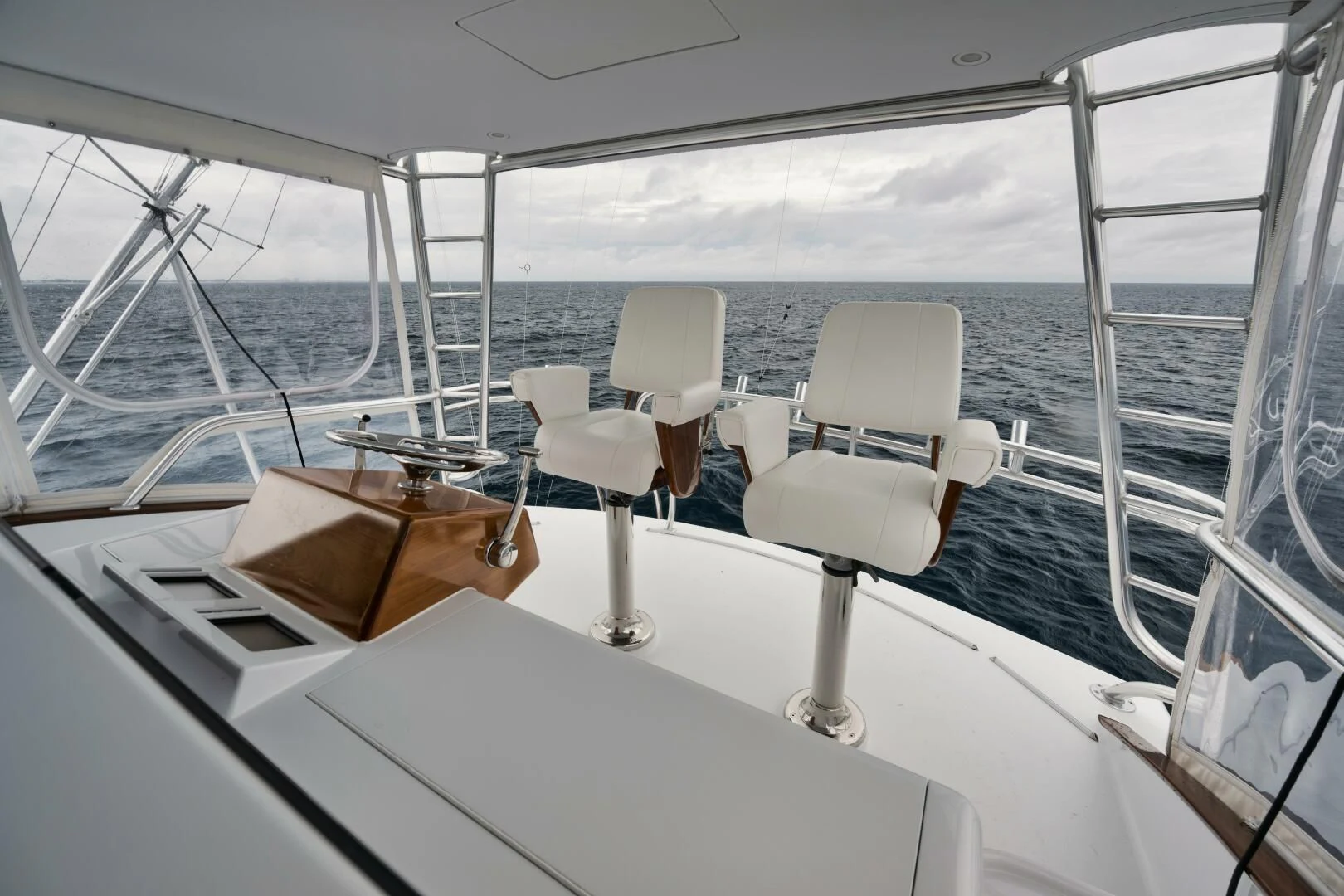 a boat with chairs on it aboard W Yacht for Sale