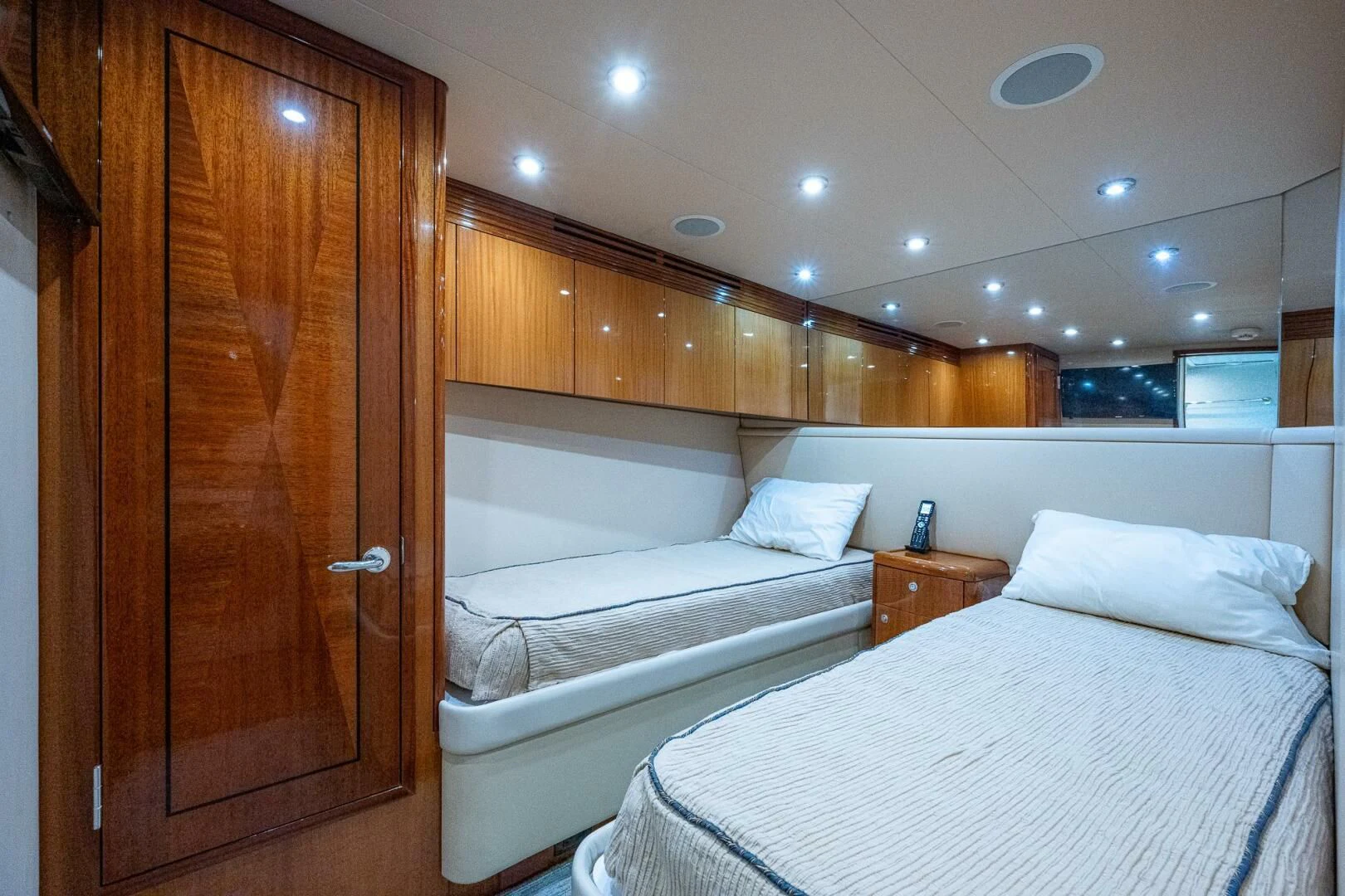 a room with a bed and a closet aboard W Yacht for Sale