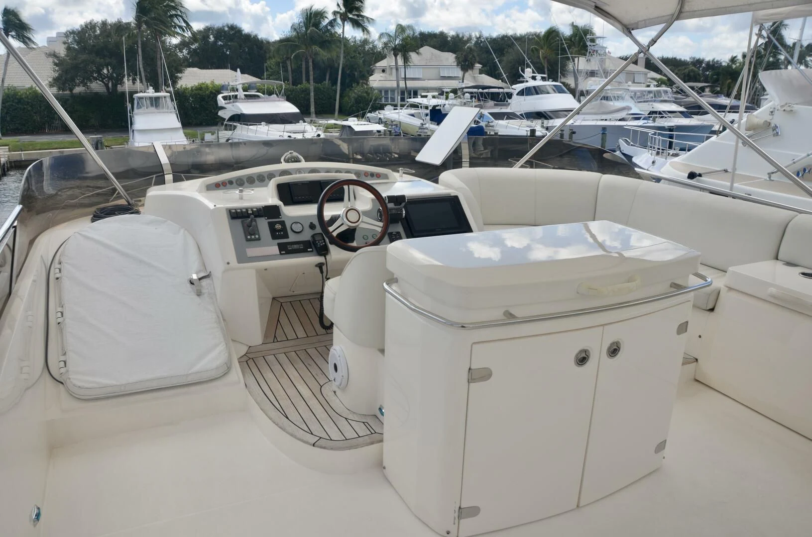 a white car with a large white box on top of it aboard W Yacht for Sale