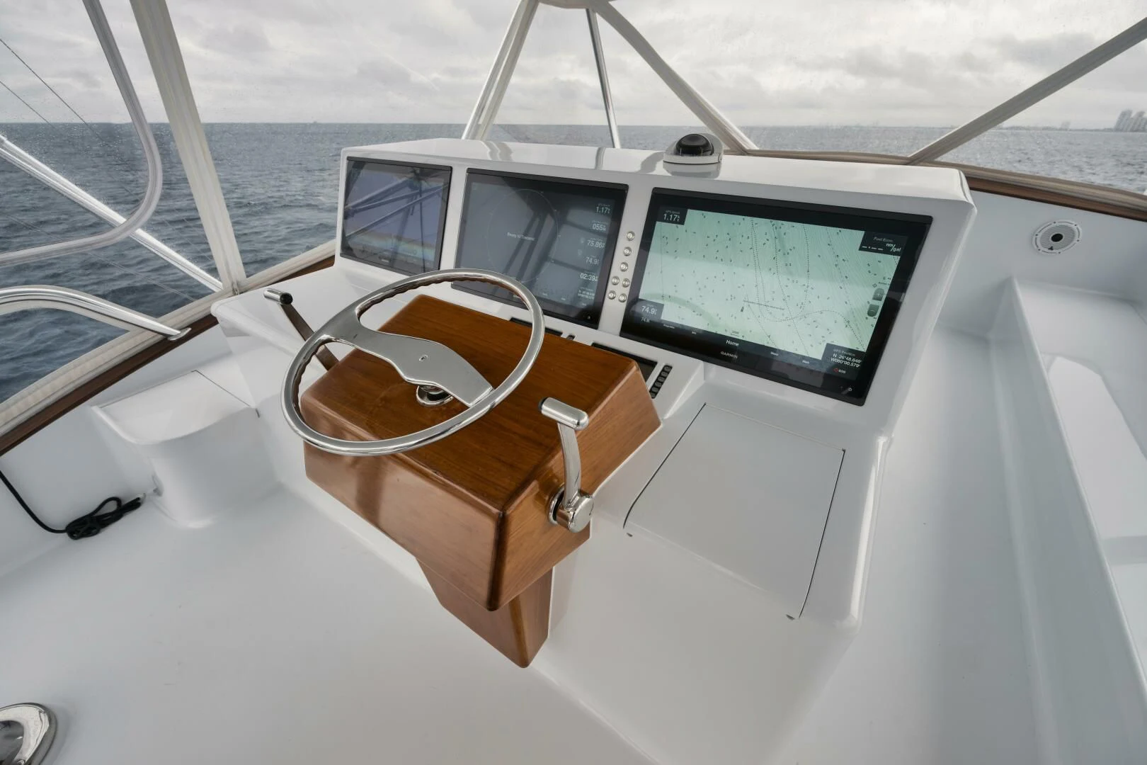 a boat with a seat and a steering wheel on the front aboard W Yacht for Sale