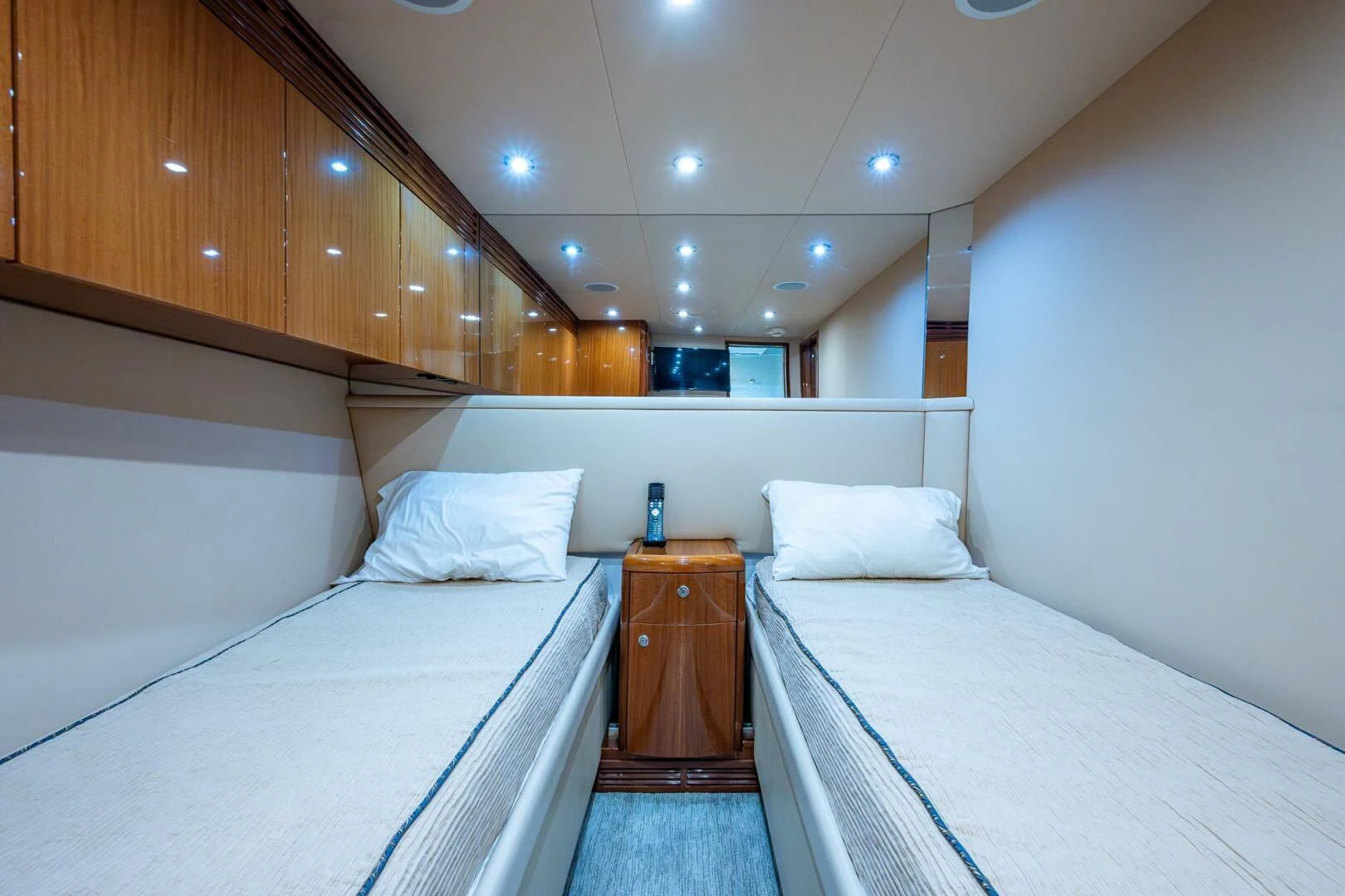 a couple of beds in a room aboard W Yacht for Sale