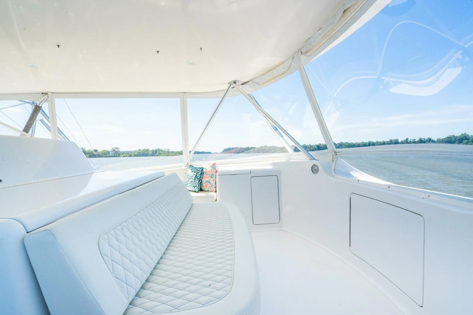 a white boat on the water aboard W Yacht for Sale