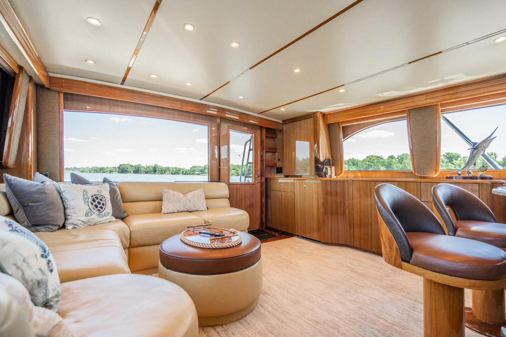 a living room with a table and chairs aboard W Yacht for Sale