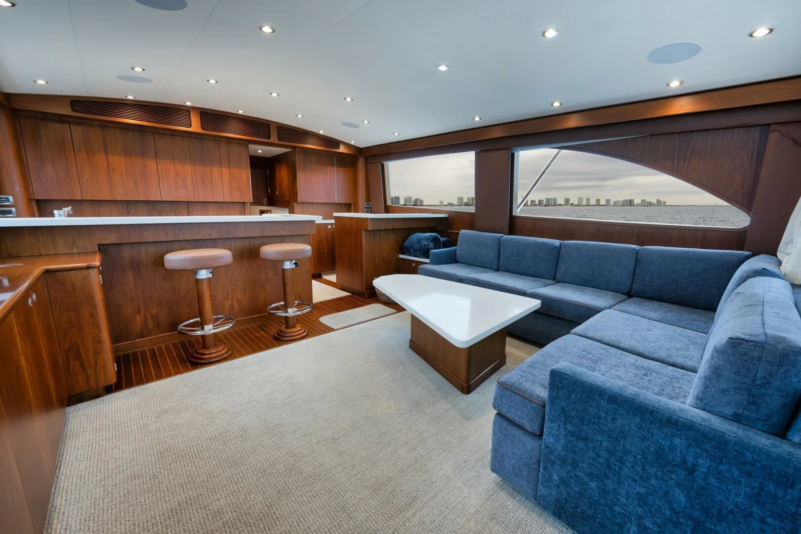 a living room with a couch and a table aboard W Yacht for Sale