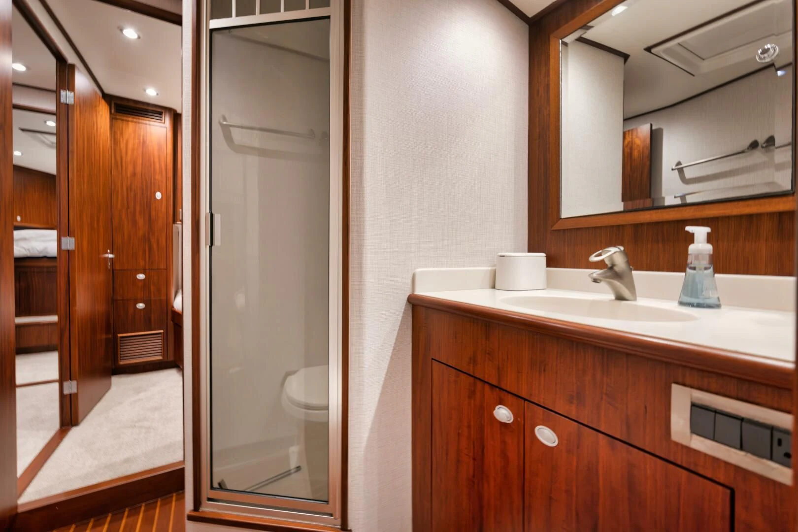 a bathroom with a sink and a shower aboard W Yacht for Sale