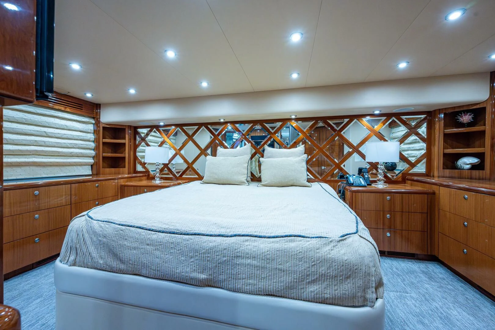 a bed with white sheets and pillows aboard W Yacht for Sale