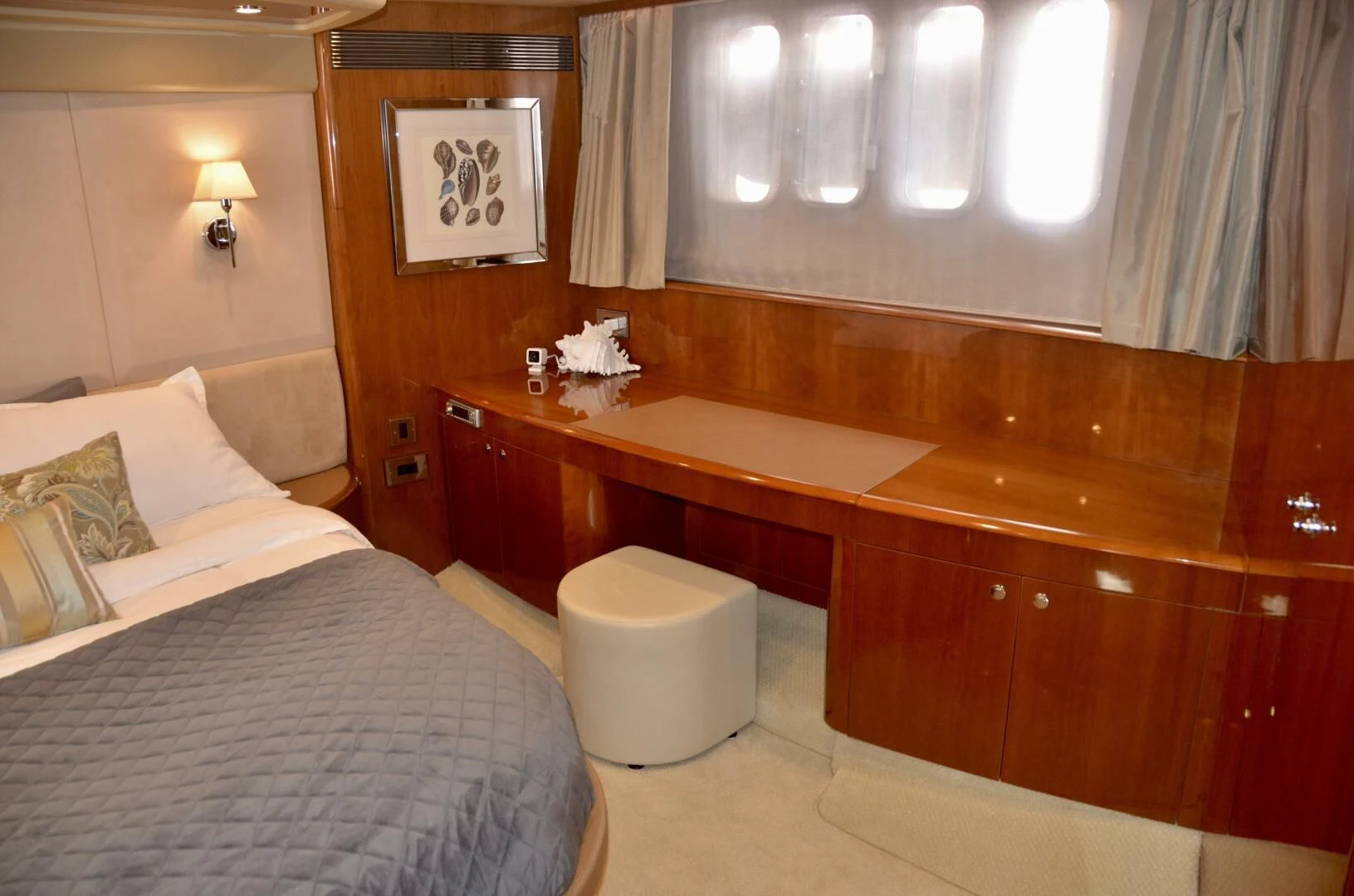 a hotel room with a bed and a sink aboard W Yacht for Sale