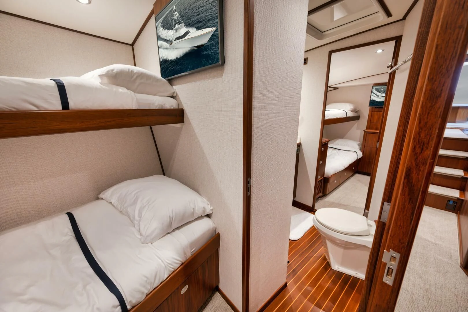 a room with a bed and a closet aboard W Yacht for Sale