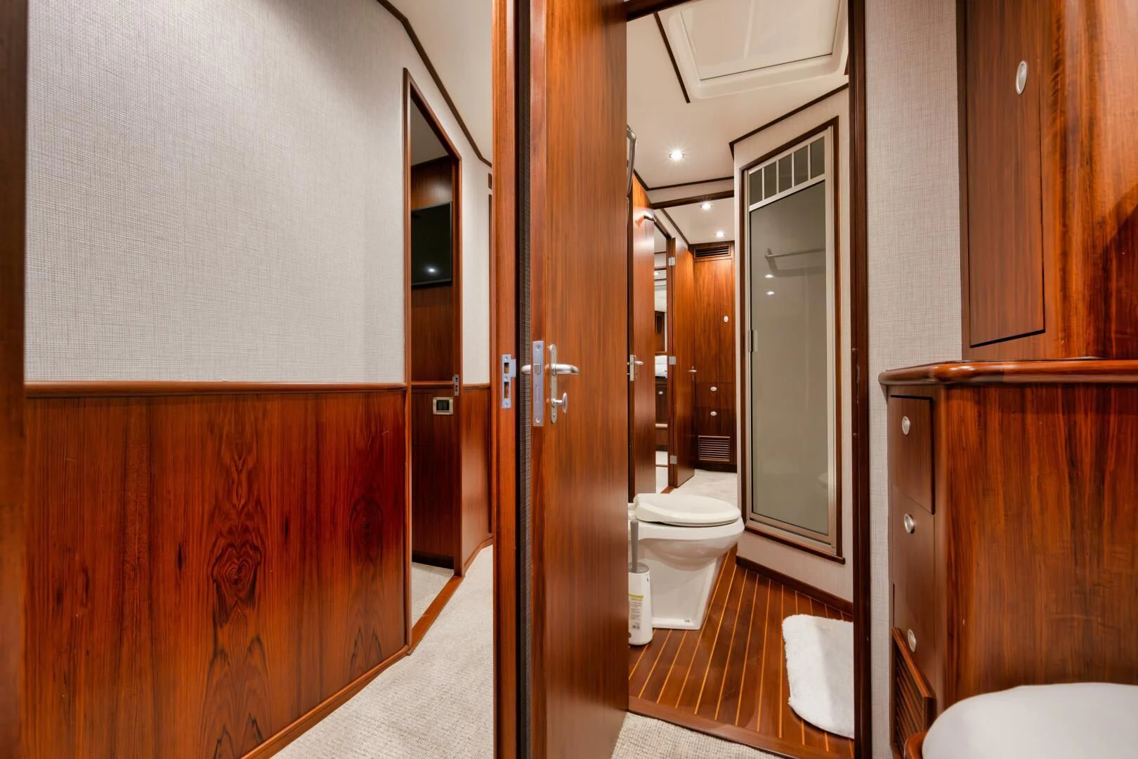 a bathroom with a toilet and a sink aboard W Yacht for Sale