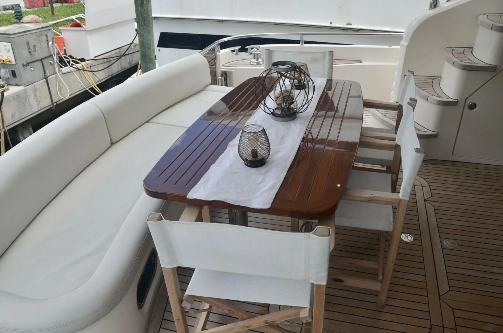 a table and chairs in a room aboard W Yacht for Sale