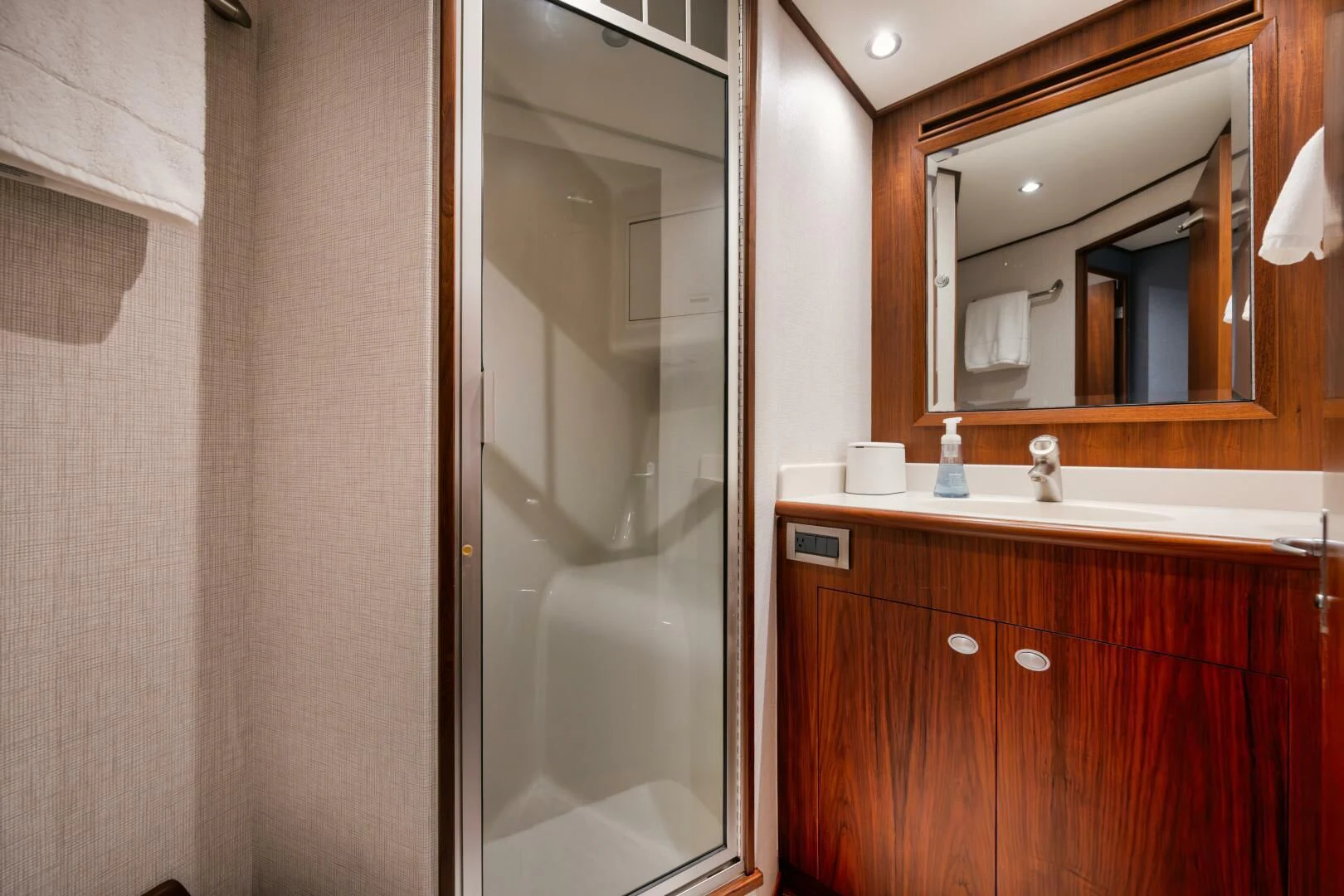 a bathroom with a large mirror aboard W Yacht for Sale