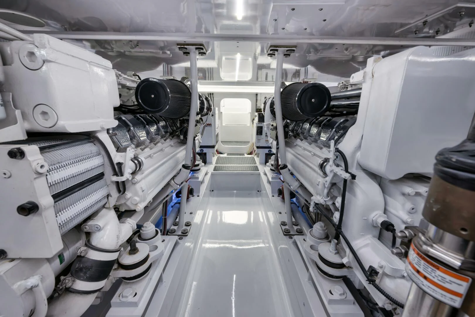 a large room with several large white machines aboard W Yacht for Sale