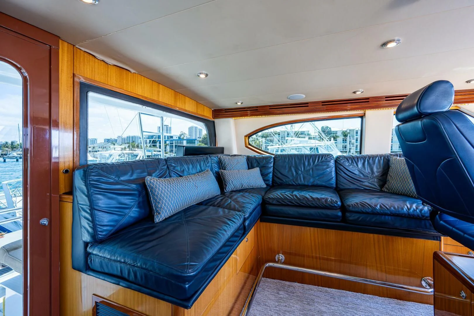 a blue couch in a room aboard W Yacht for Sale