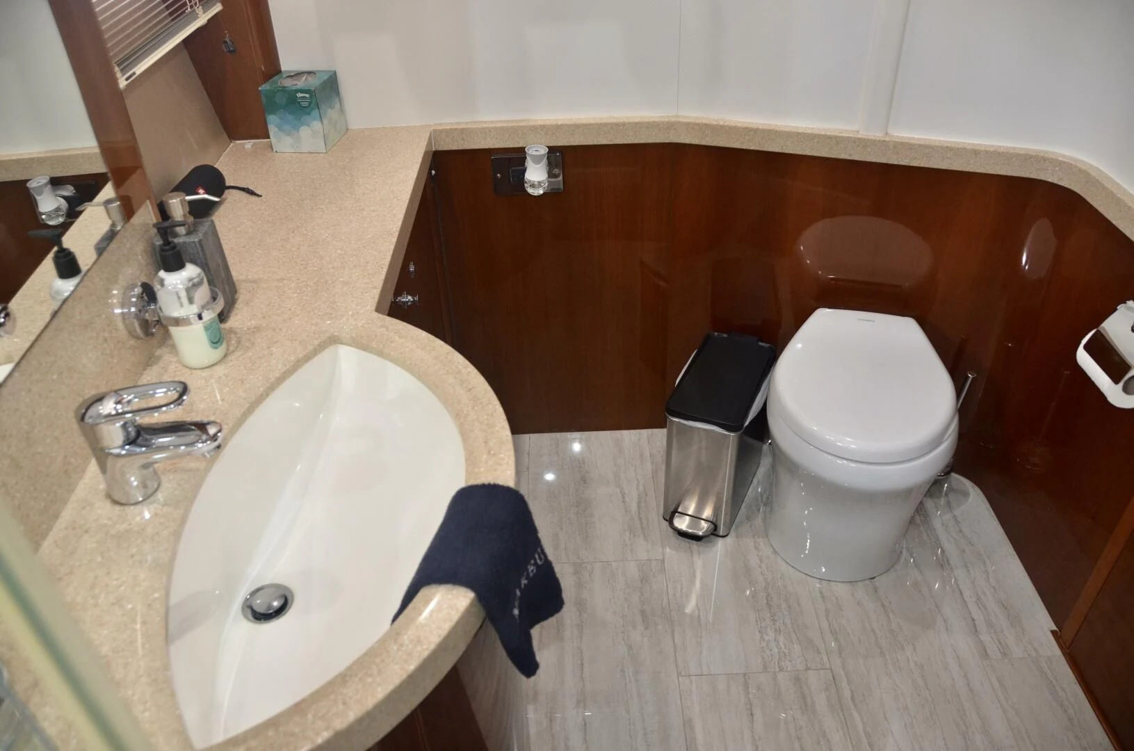 a bathroom with a sink and toilet aboard W Yacht for Sale