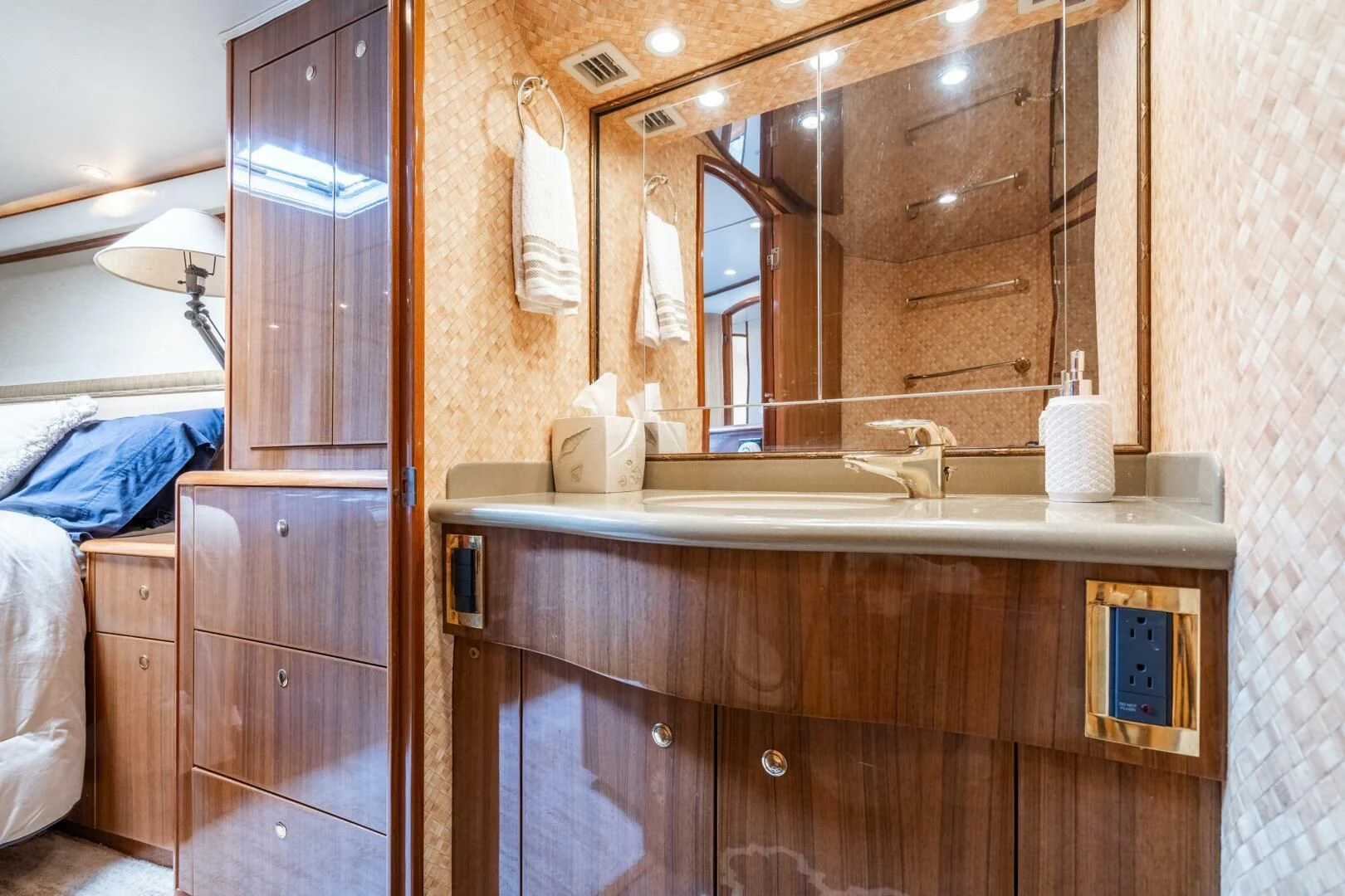a bathroom with a large mirror aboard W Yacht for Sale