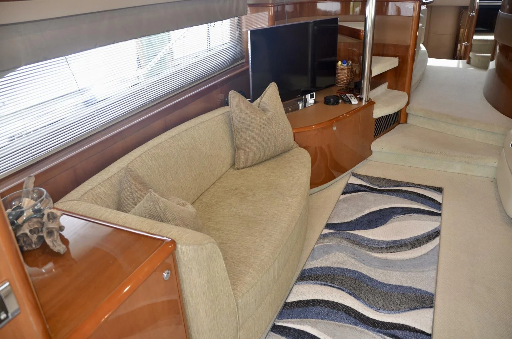 a couch in a living room aboard W Yacht for Sale
