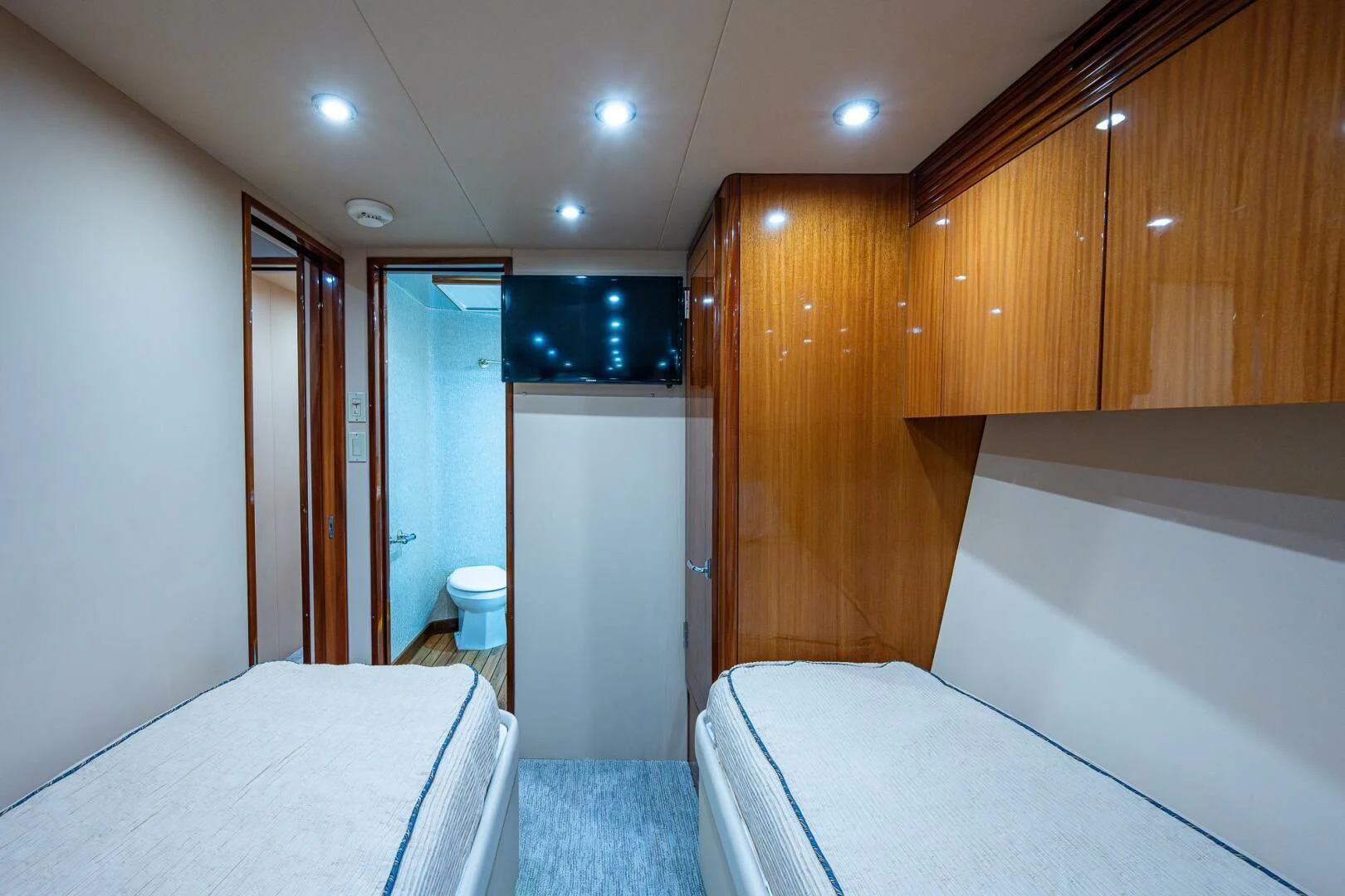 a room with a bed and a closet aboard W Yacht for Sale
