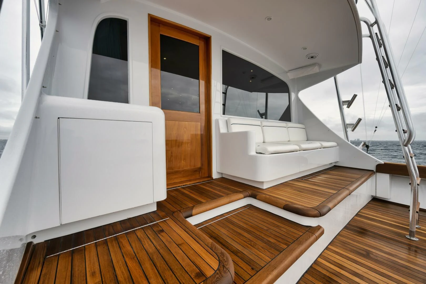a room with a bed and a door aboard W Yacht for Sale