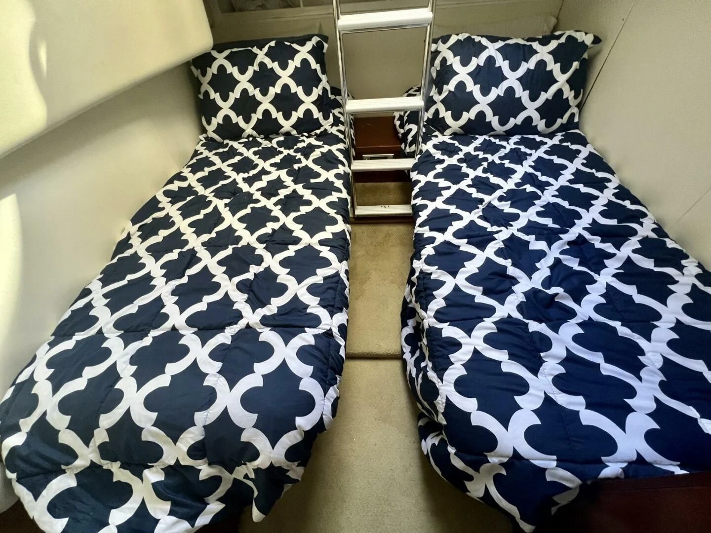 a set of pillows on a couch aboard W Yacht for Sale