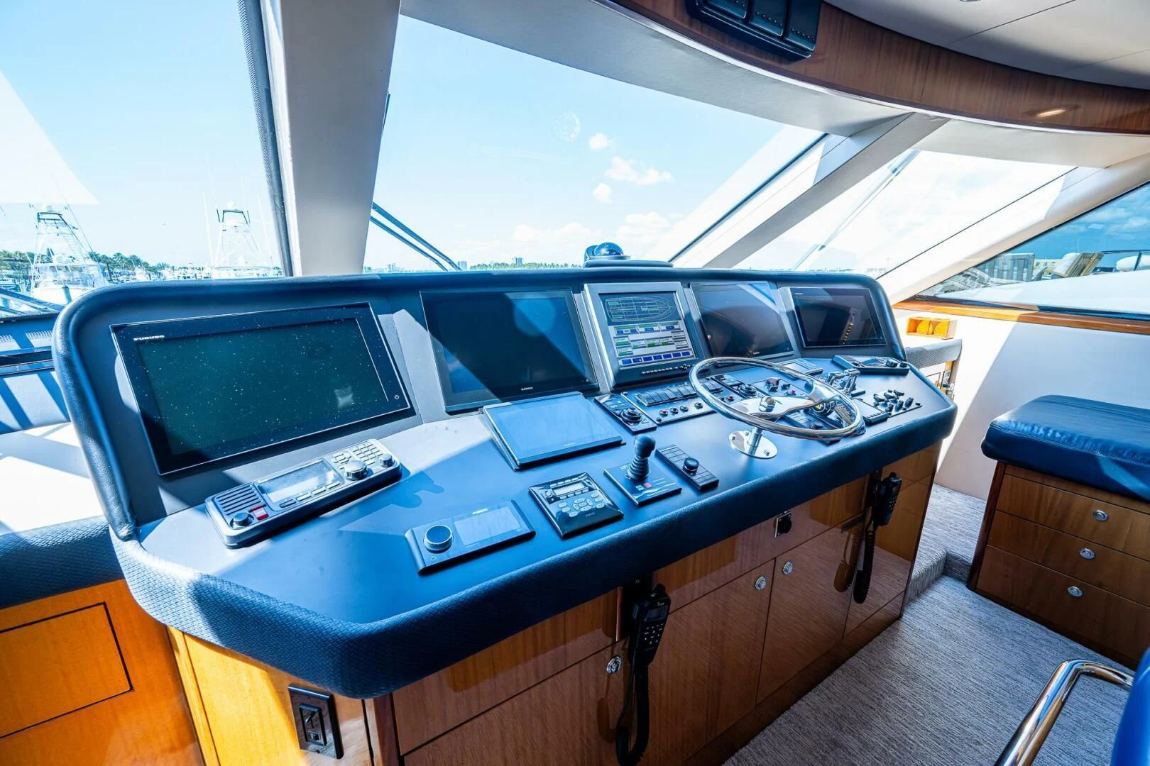 a table with many computers on it aboard W Yacht for Sale
