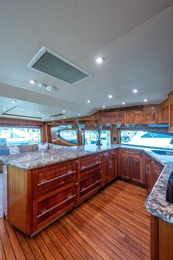 a kitchen with a large island aboard W Yacht for Sale