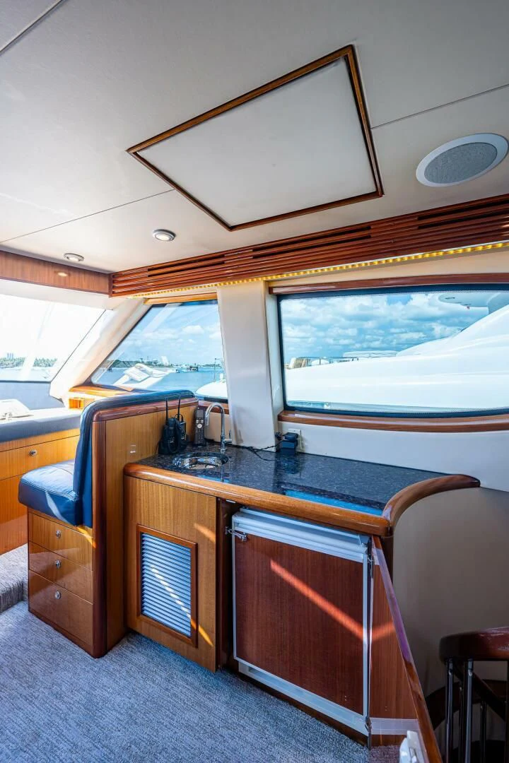 a room with a desk and a window aboard W Yacht for Sale