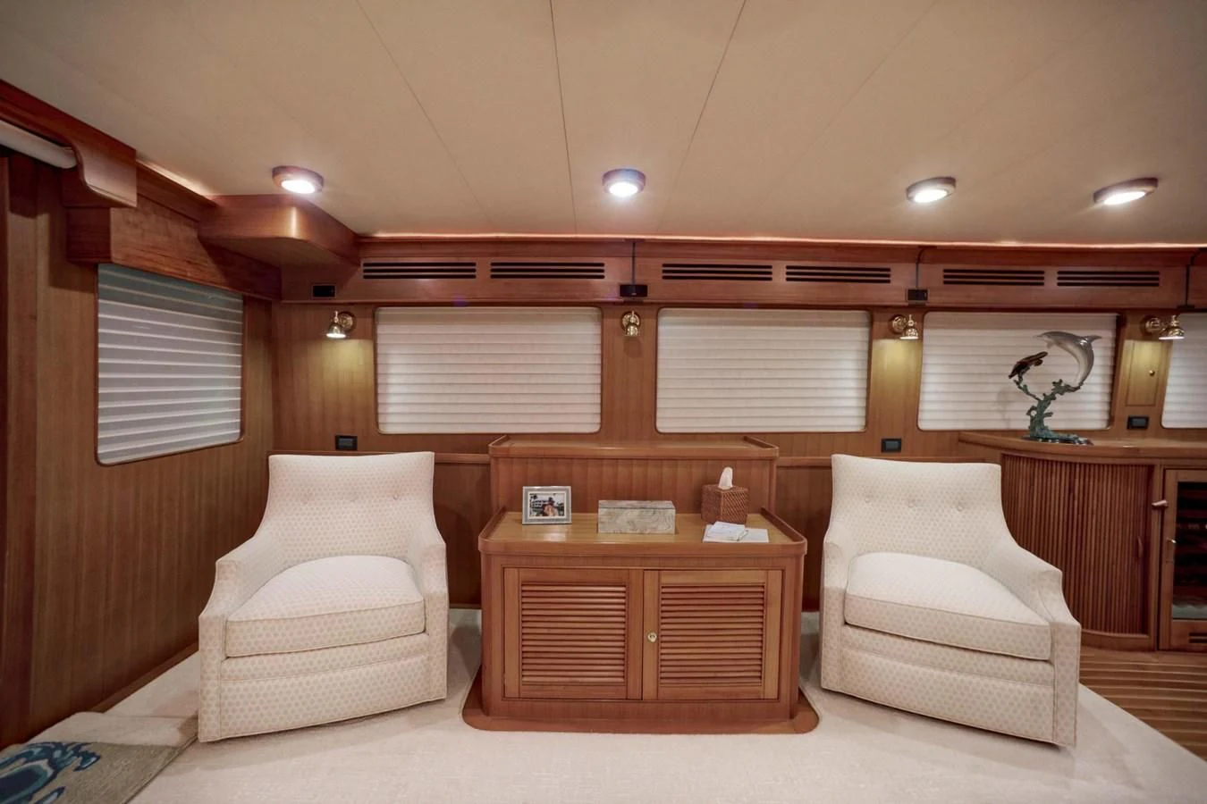 a room with a couch and a table aboard JUBILEE Yacht for Sale