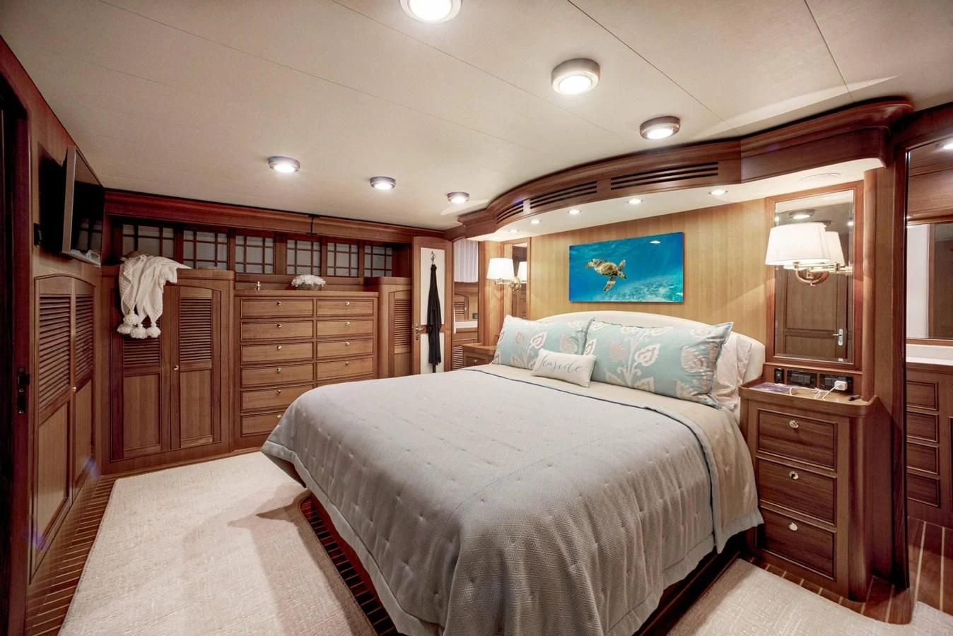 a bedroom with a large bed aboard JUBILEE Yacht for Sale
