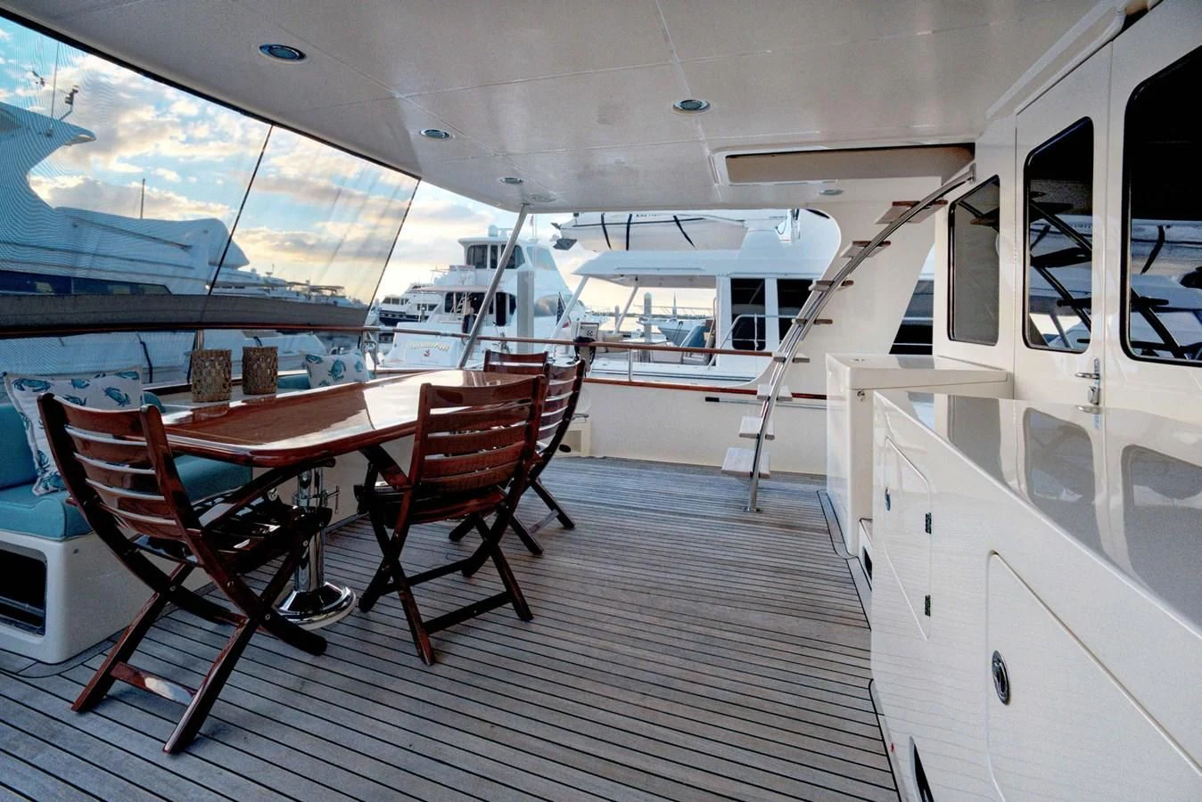 a boat with a table and chairs aboard JUBILEE Yacht for Sale