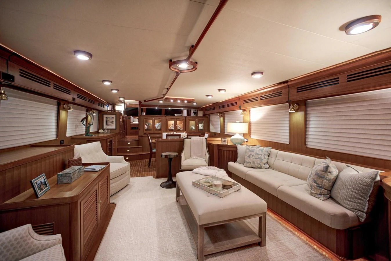 a living room with a couch and a coffee table aboard JUBILEE Yacht for Sale