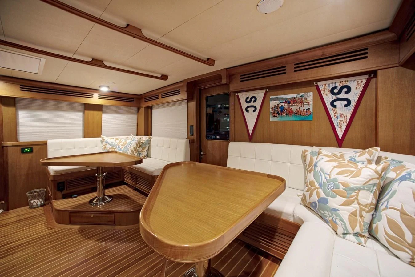 a room with a bed and a table aboard JUBILEE Yacht for Sale