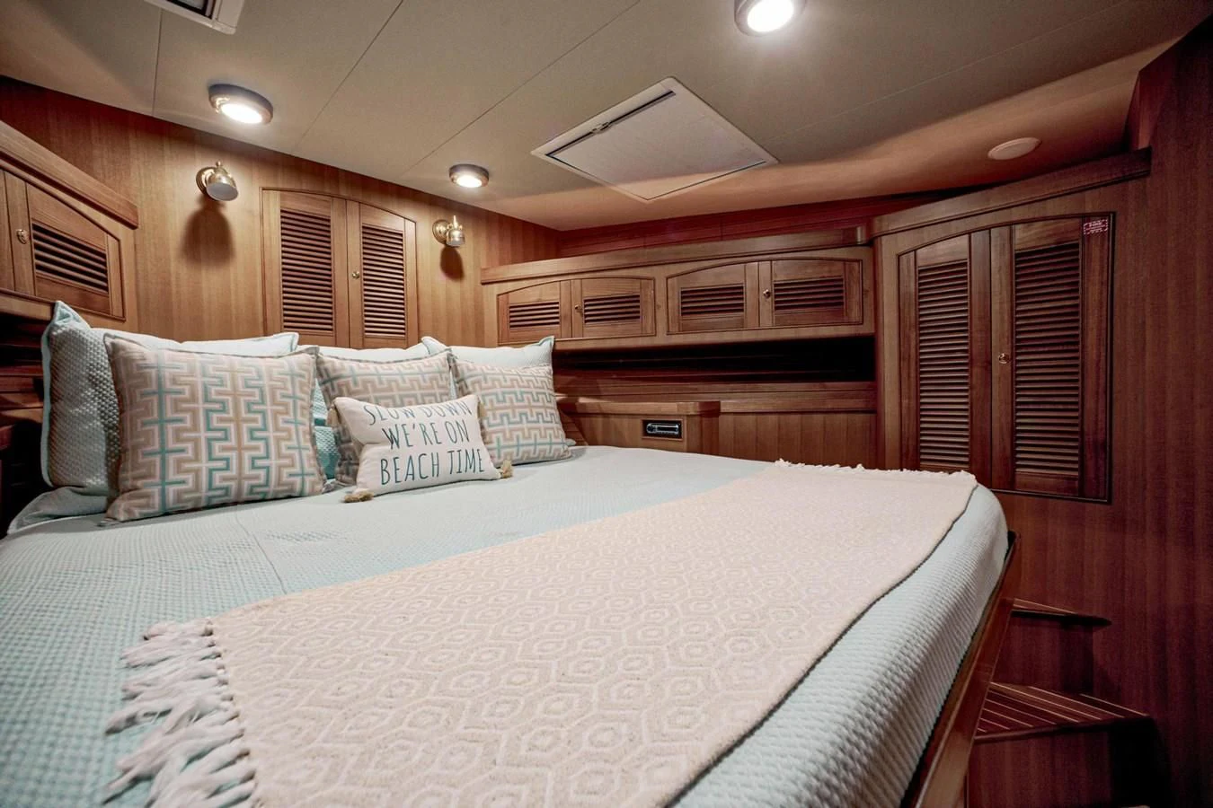 a large bed in a cabin aboard JUBILEE Yacht for Sale