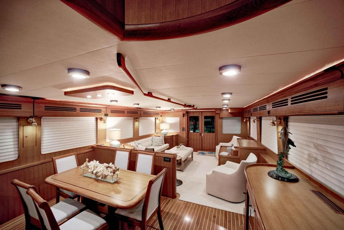 a dining room with a table and chairs aboard JUBILEE Yacht for Sale