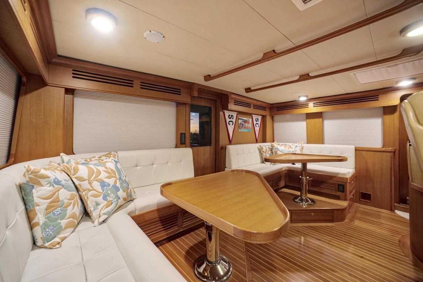 a room with a couch and a table aboard JUBILEE Yacht for Sale