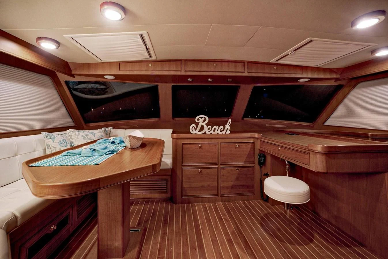 a room with a table and chairs aboard JUBILEE Yacht for Sale