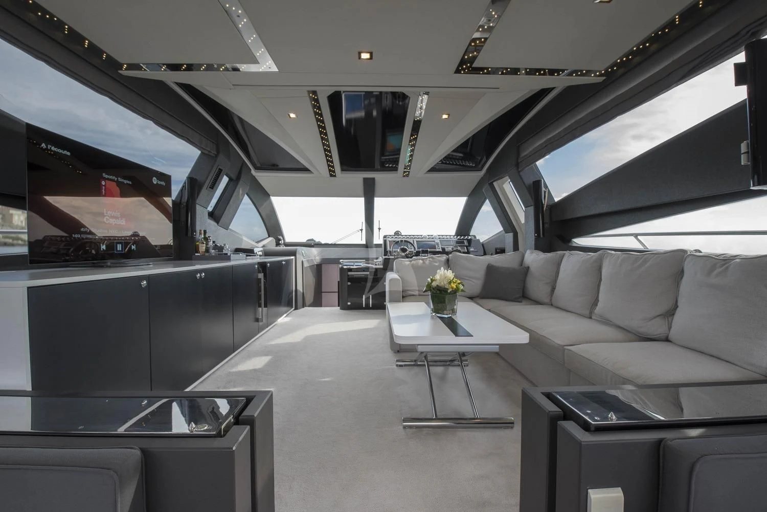 a room with a couch and a table aboard MORRIGAN Yacht for Sale