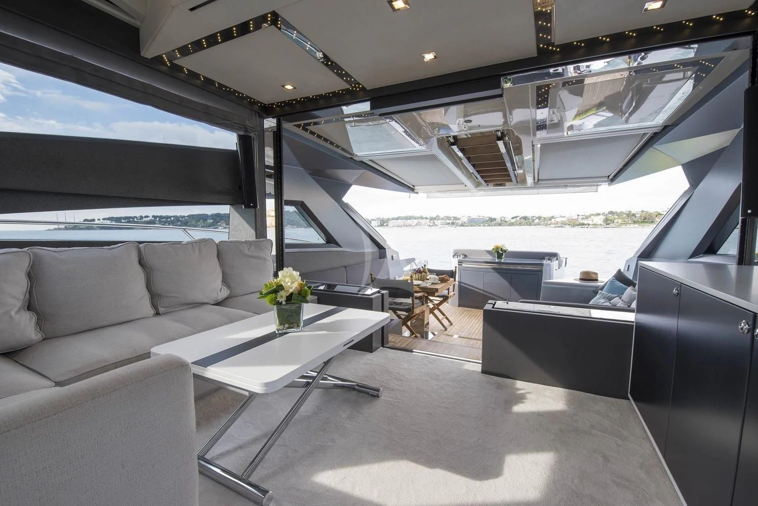 a room with a couch and a table aboard MORRIGAN Yacht for Sale