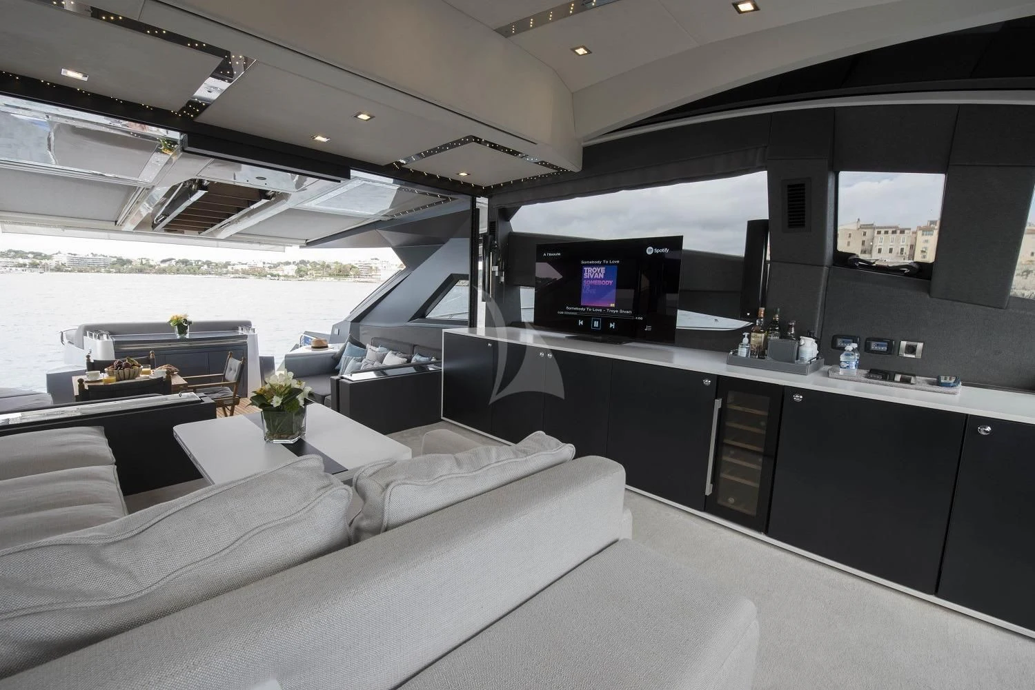 a room with a couch and a tv aboard MORRIGAN Yacht for Sale