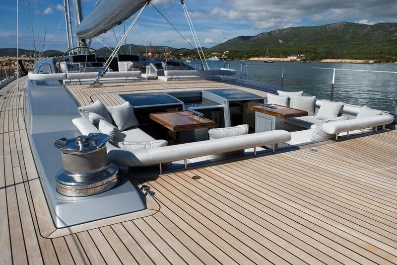 a deck with a large boat on it aboard MYSTERE Yacht for Sale