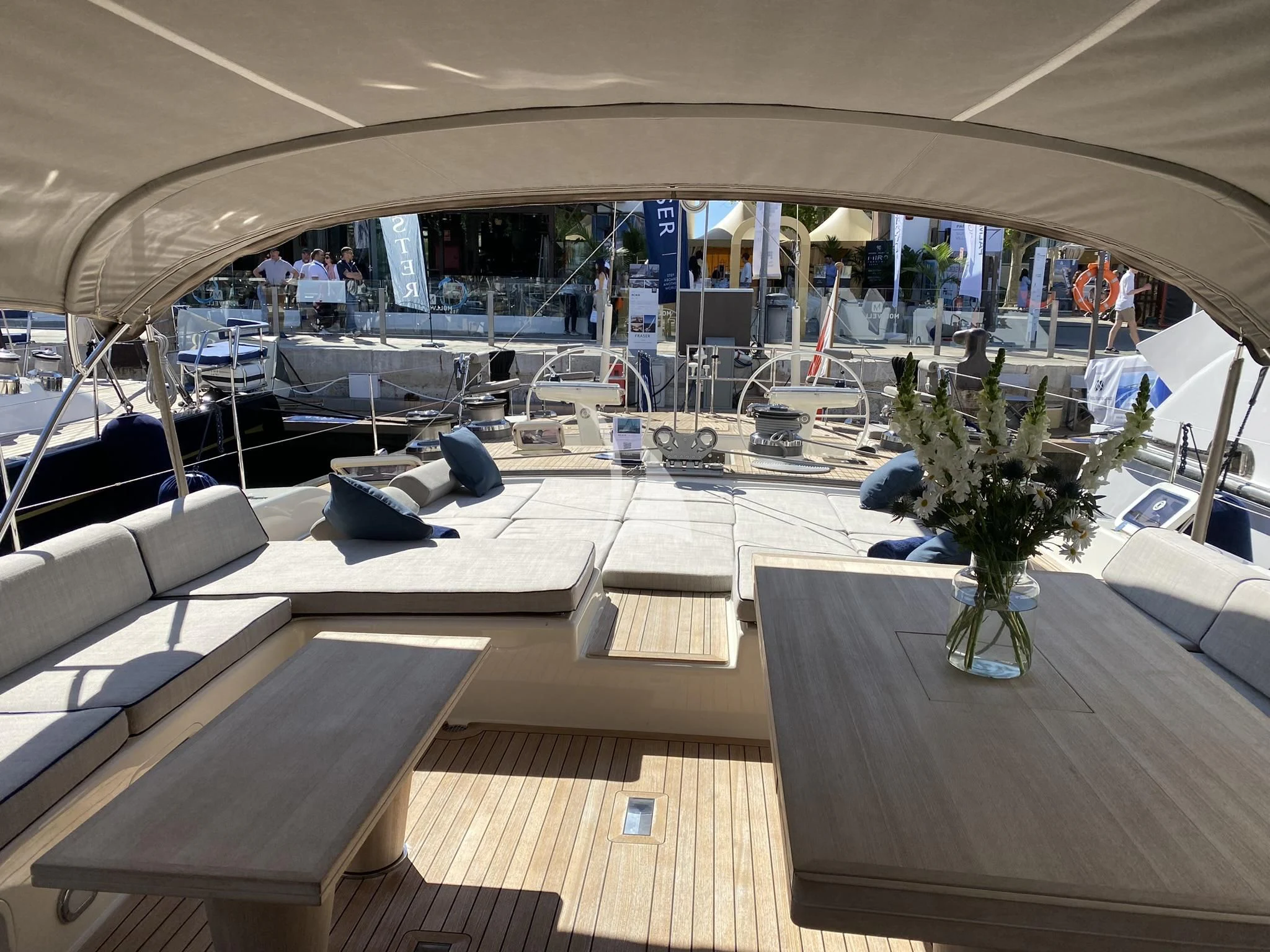 a room with a table and chairs aboard ACAIA Yacht for Sale