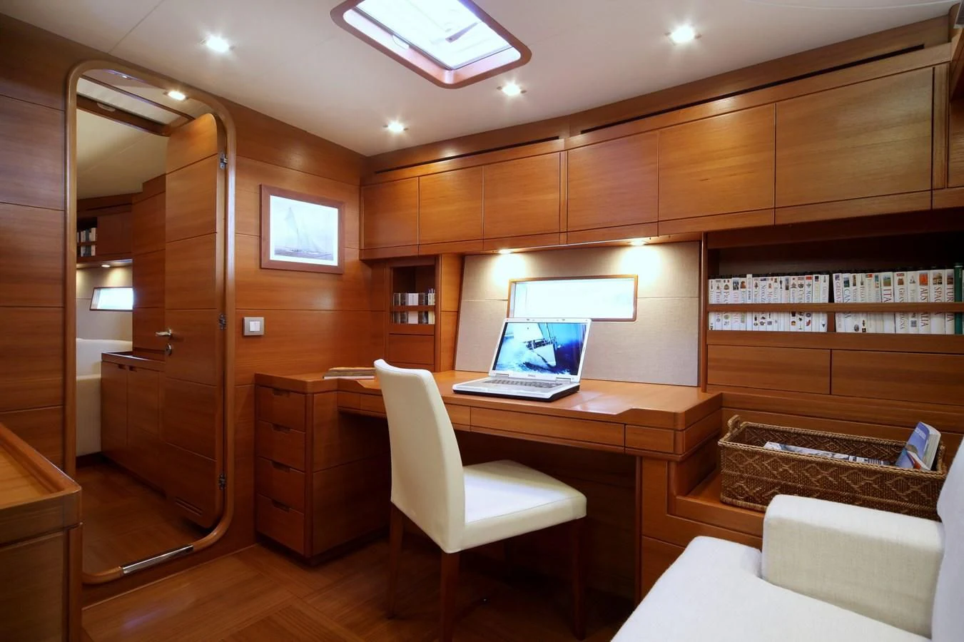 a room with a desk and a computer aboard ACAIA Yacht for Sale