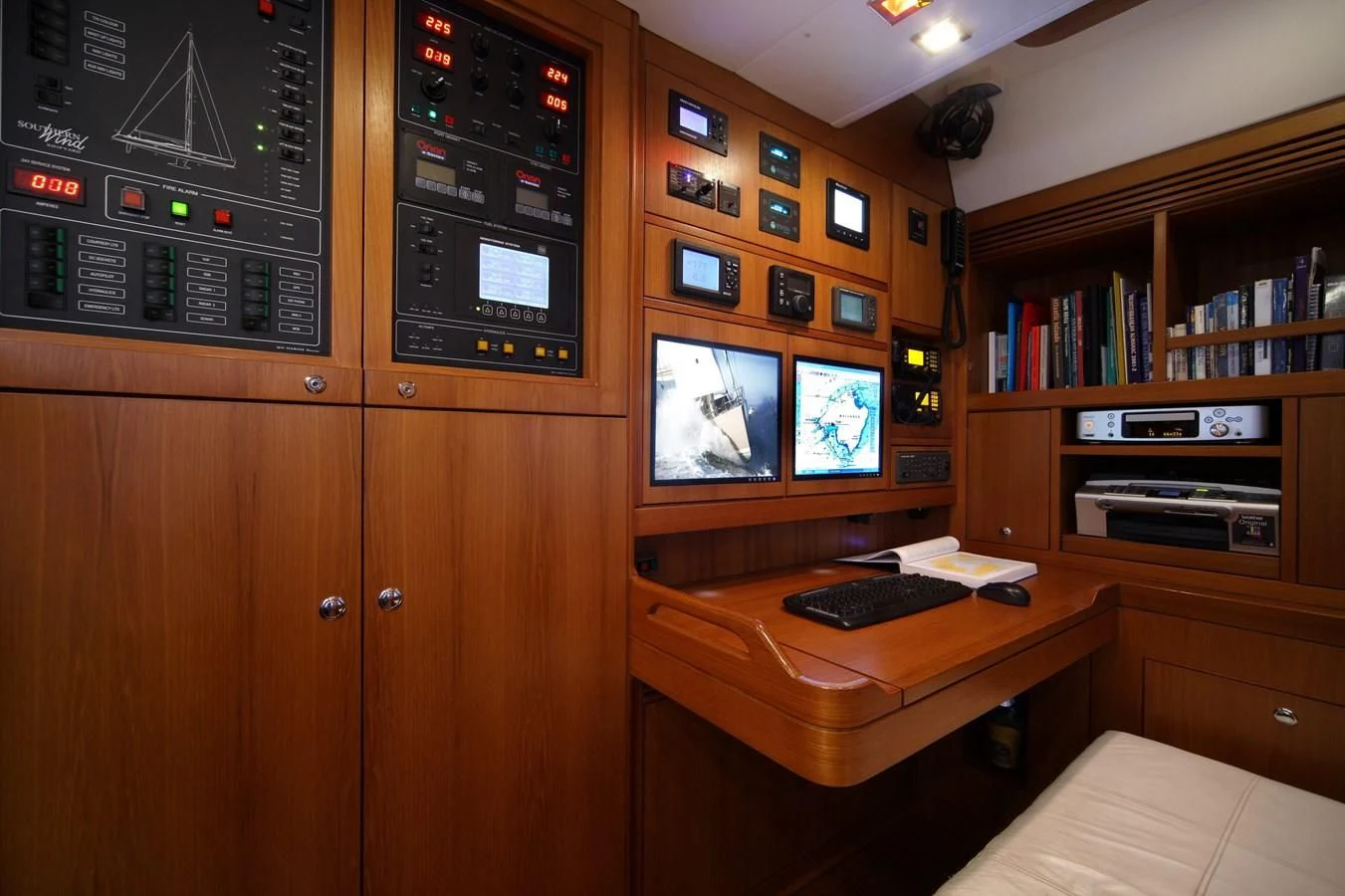 a room with a desk and computer aboard ACAIA Yacht for Sale