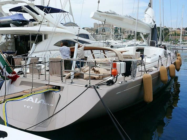a couple of people on a boat aboard ACAIA Yacht for Sale