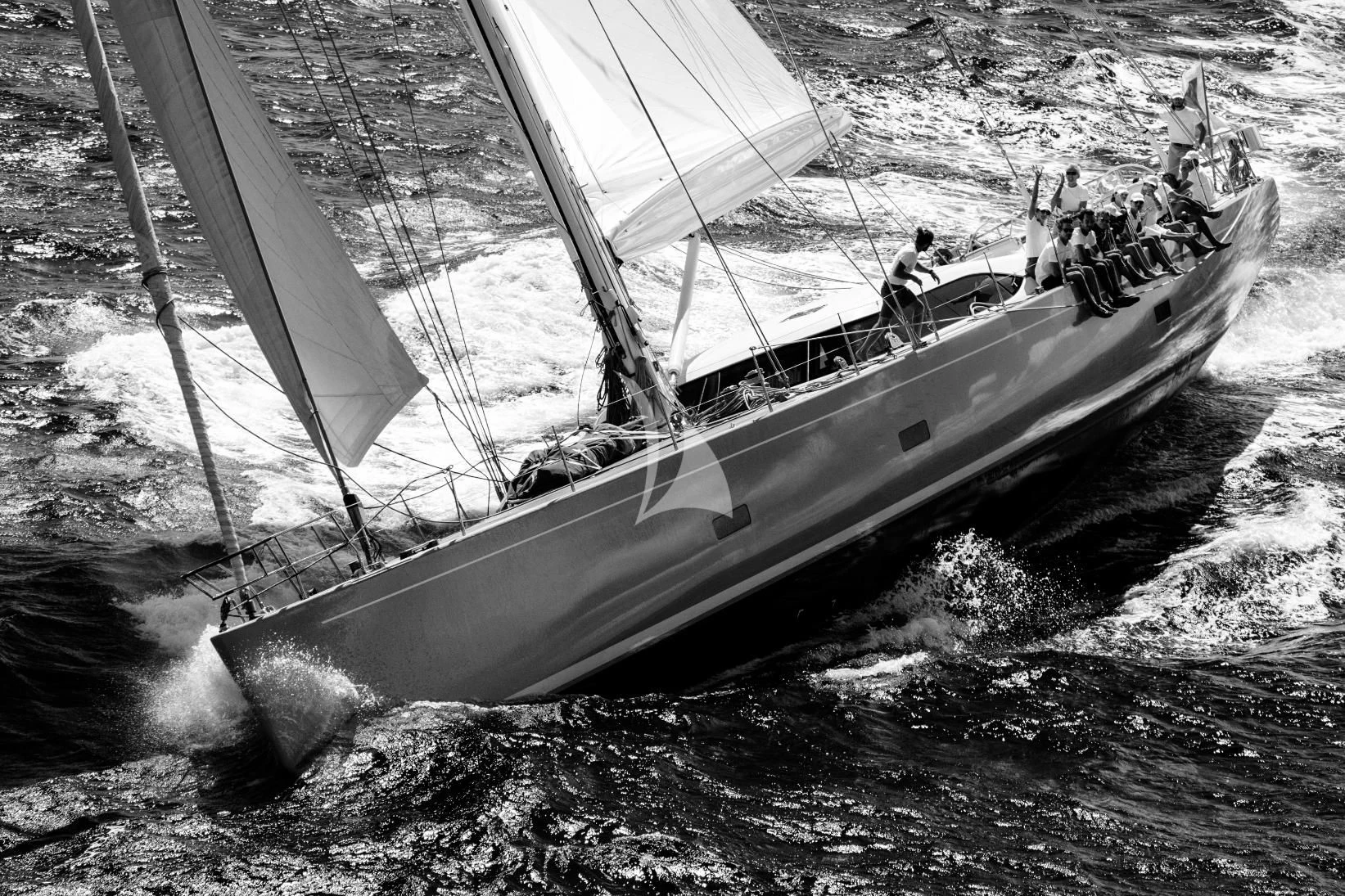 a group of people sailing on a boat aboard ACAIA Yacht for Sale